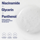 Product label with niacinamide, glycerin, and panthenol text on a white background with bubbles.