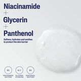 Skincare product with niacinamide, glycerin, and panthenol text on a white background