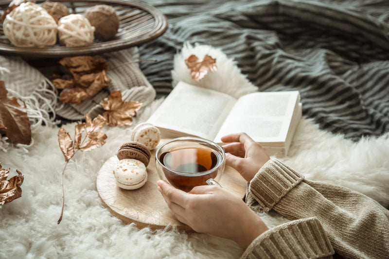 autumn still life girl holding cup tea