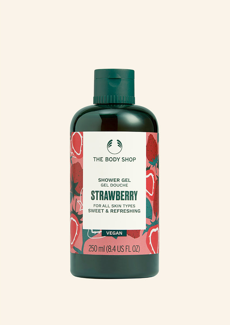 Bottle of The Body Shop Strawberry shower gel on a white background